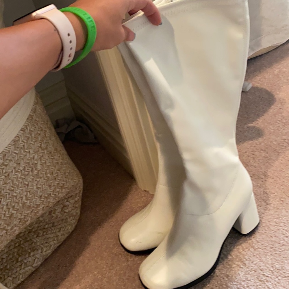 Tall white boots